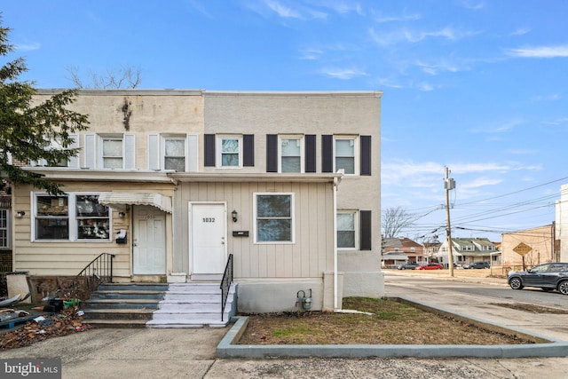 townhome / multi-family property with entry steps