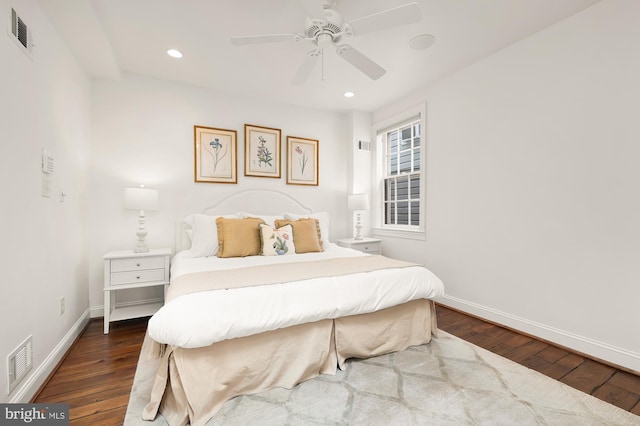 bedroom featuring baseboards, visible vents, dark wood-style flooring, and recessed lighting