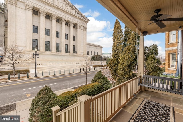 balcony featuring ceiling fan and covered porch