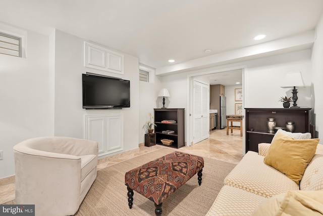 living area featuring recessed lighting