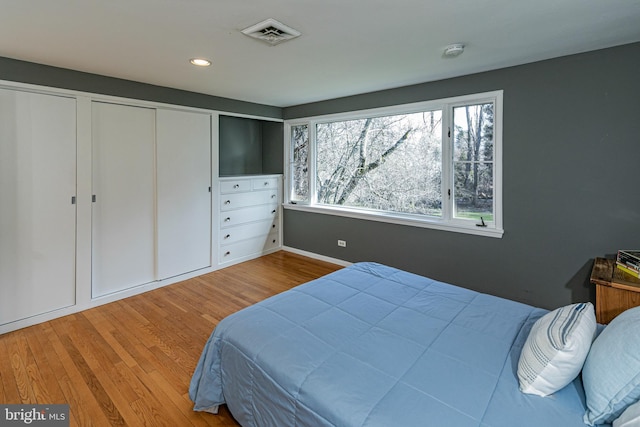 bedroom featuring hardwood / wood-style floors