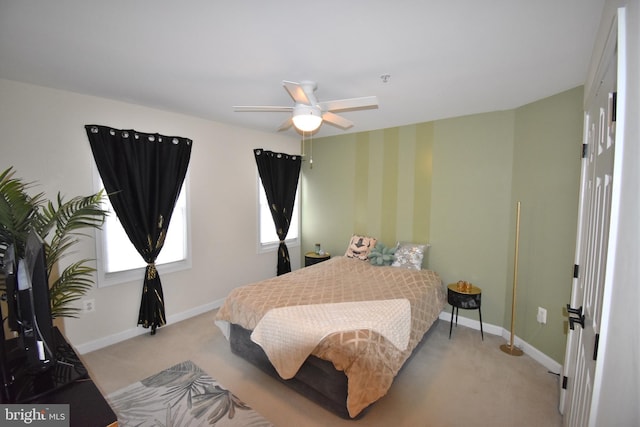 bedroom featuring carpet, ceiling fan, and baseboards