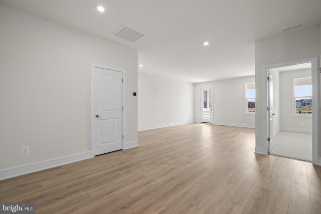 empty room featuring light hardwood / wood-style floors