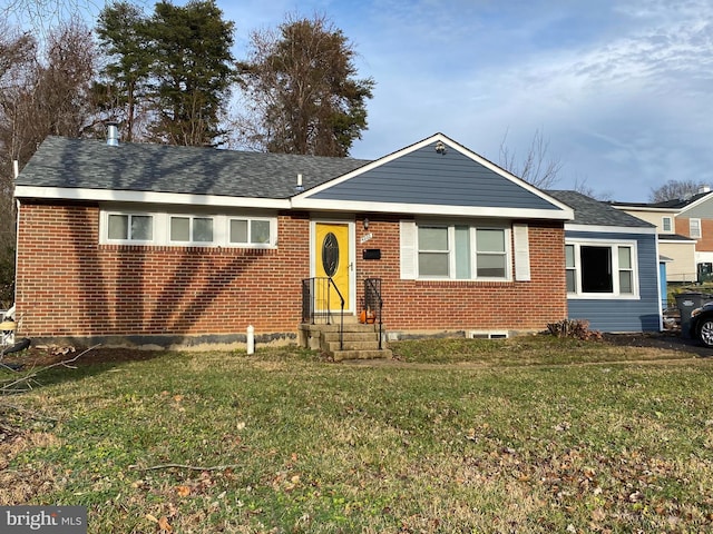 view of front of home with a front lawn