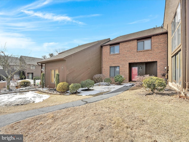 multi unit property featuring brick siding