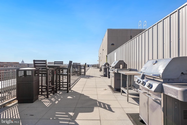 view of patio with a grill