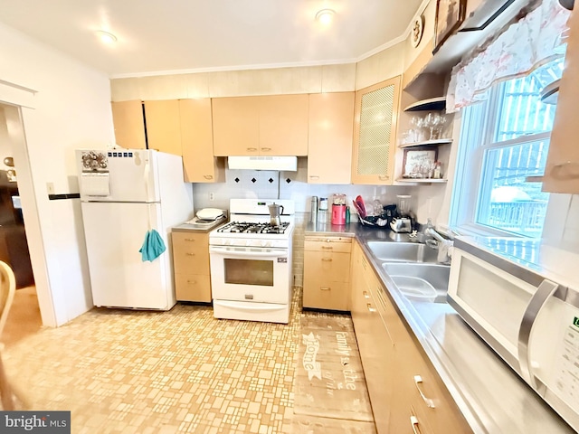 kitchen with ornamental molding, sink, white appliances, and light brown cabinets