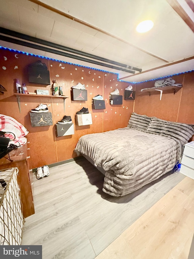 bedroom featuring hardwood / wood-style floors