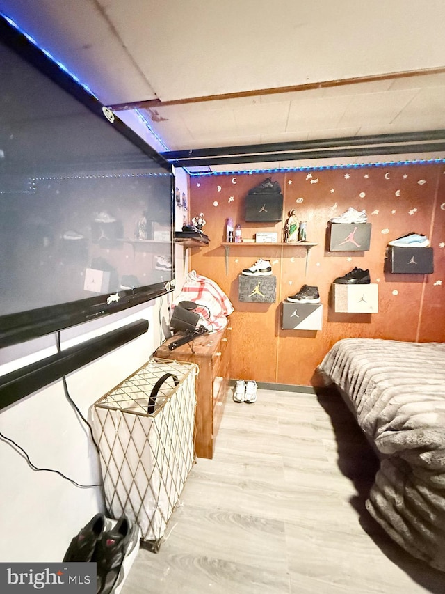 bedroom featuring wood-type flooring