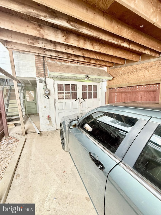 garage with washing machine and dryer