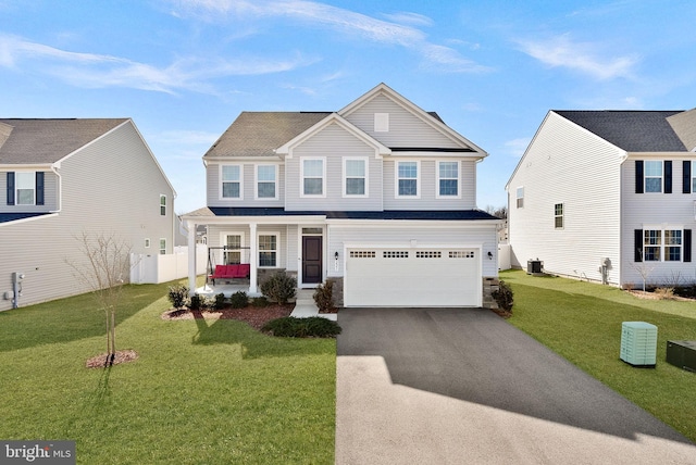 view of front of home featuring aphalt driveway, a porch, an attached garage, central AC unit, and a front lawn