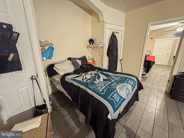 bedroom with wood finish floors