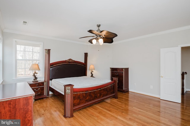 bedroom featuring ornamental molding, ceiling fan, light wood-style flooring, and baseboards