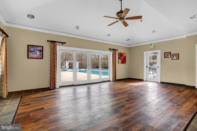 unfurnished room with baseboards, a ceiling fan, hardwood / wood-style flooring, and crown molding