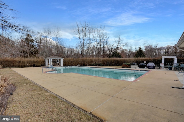 view of pool with a gazebo, a patio area, and a fenced in pool