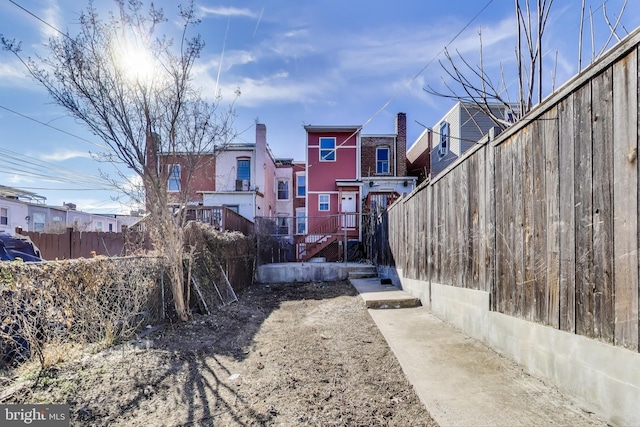 view of yard with a residential view and fence