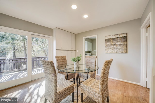 dining area featuring baseboards, recessed lighting, and light wood-style floors