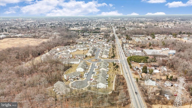 birds eye view of property with a residential view