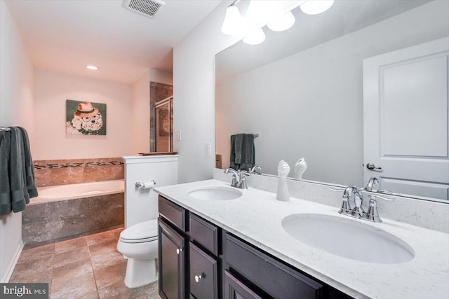 full bathroom with a garden tub, toilet, a sink, and visible vents