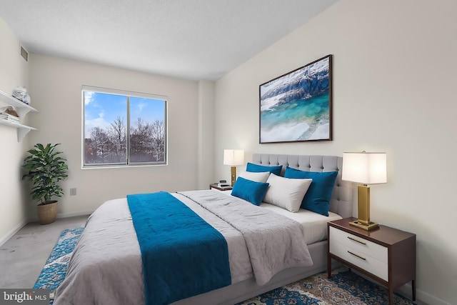 bedroom with carpet flooring, visible vents, and baseboards