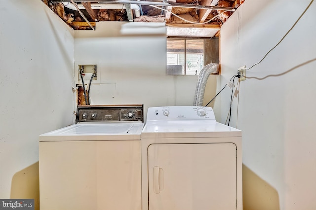 washroom featuring laundry area and washer and dryer