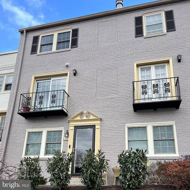 multi unit property featuring brick siding