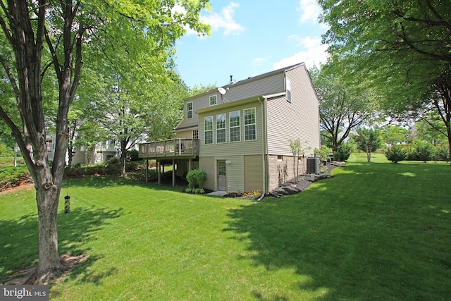 15516 Wigeon Way, Woodbridge, VA 22191 - back of property with central AC, a yard, and a wooden deck