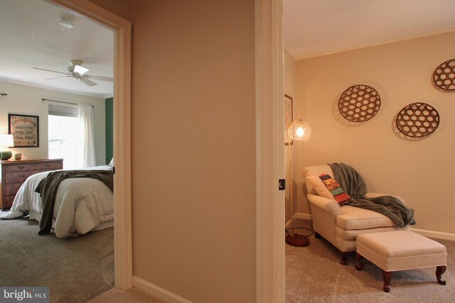 15516 Wigeon Way, Woodbridge, VA 22191 - sitting room with carpet flooring, a ceiling fan, baseboards, and crown molding