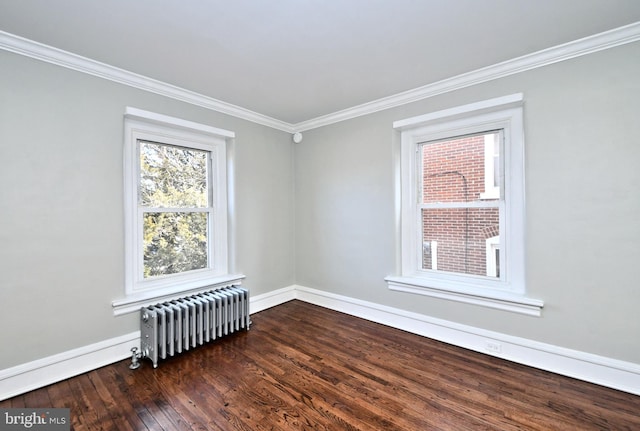 28 N 2nd St, Souderton, PA 18964 - spare room with radiator, crown molding, and dark hardwood / wood-style floors