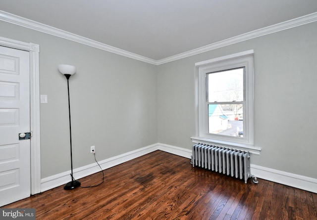 28 N 2nd St, Souderton, PA 18964 - spare room with ornamental molding, radiator, and dark wood-type flooring
