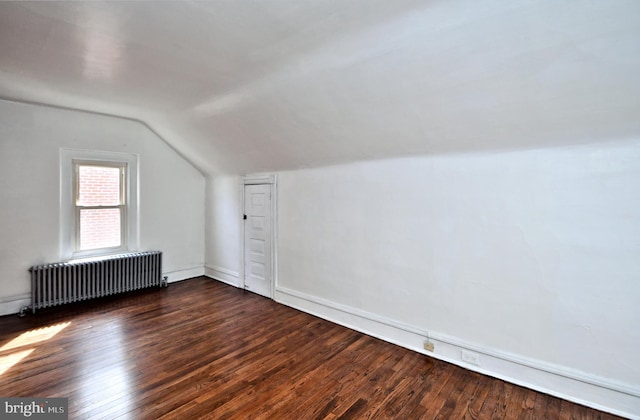 28 N 2nd St, Souderton, PA 18964 - additional living space featuring radiator heating unit, lofted ceiling, and dark hardwood / wood-style floors