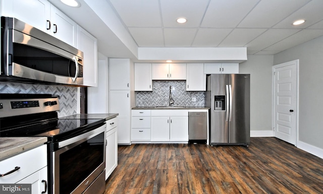 28 N 2nd St, Souderton, PA 18964 - kitchen featuring appliances with stainless steel finishes, sink, dark hardwood / wood-style floors, and white cabinets