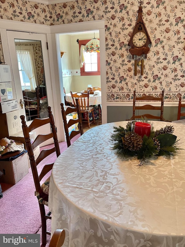 dining area featuring carpet floors