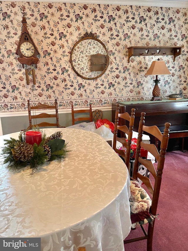 view of carpeted dining space