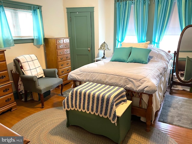 bedroom featuring hardwood / wood-style flooring