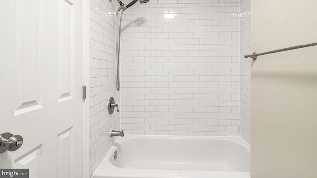 bathroom featuring  shower combination