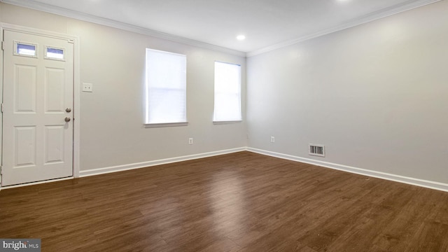 foyer entrance featuring baseboards, visible vents, dark wood-style flooring, crown molding, and recessed lighting