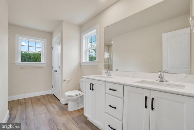 157 Eli Dr, York, PA 17404 - bathroom with plenty of natural light, baseboards, a shower with door, and toilet