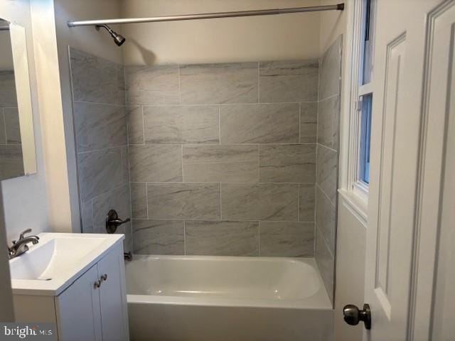 full bath with vanity and shower / bathing tub combination