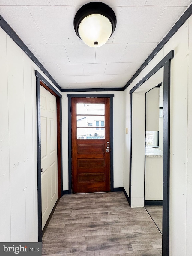 hall with wood finished floors