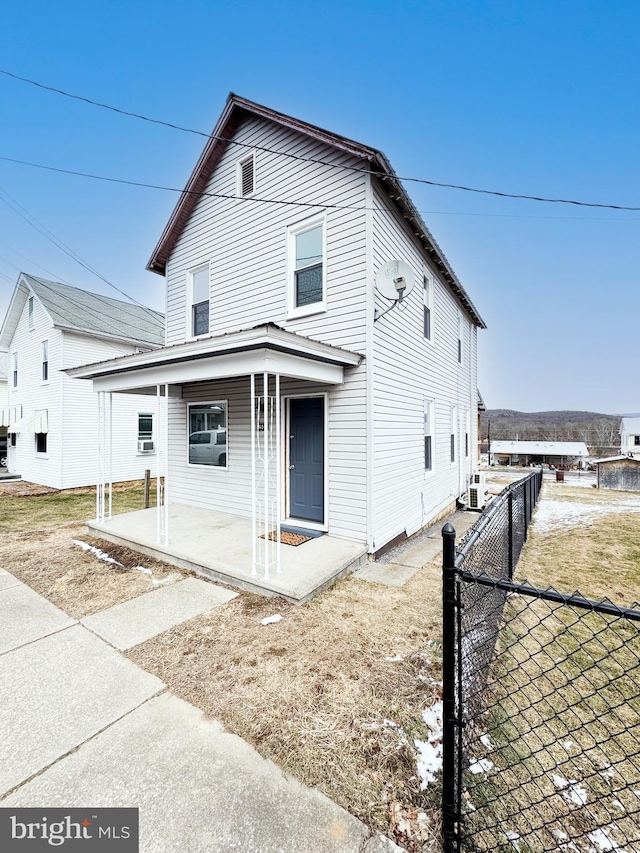 view of front of property with fence