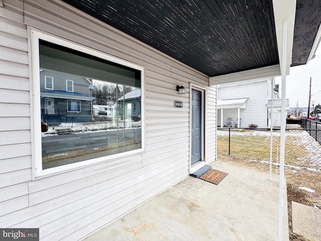 view of patio featuring fence