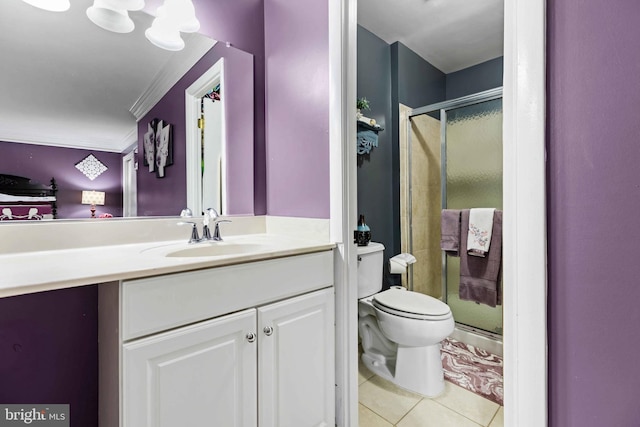 bathroom with vanity, tile patterned flooring, toilet, and walk in shower