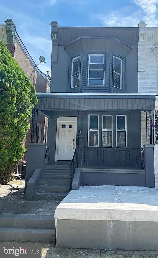 view of front of home featuring covered porch