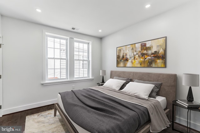 bedroom featuring hardwood / wood-style floors