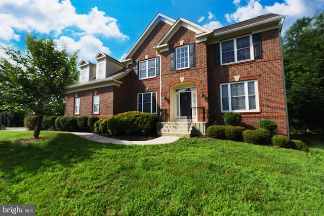 view of front of property with a front lawn