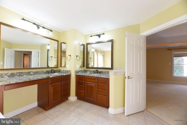 bathroom with vanity and tile patterned flooring