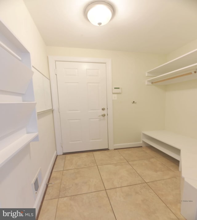 interior space with light tile patterned floors