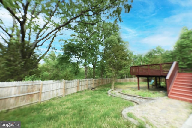 view of yard featuring a deck