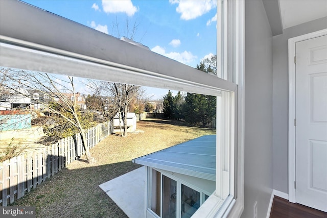 view of yard with a fenced backyard